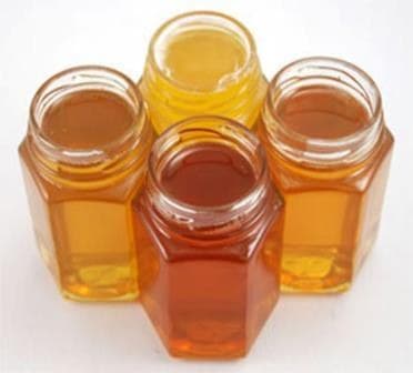 Honey presentation linked to quality, traceability, and value addition.